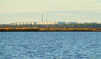 Озеро на болоте «Усванюр». Виден вдали Усинск. Автор Nikolay Alexandrov